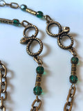 Glasses Chain – Snake Infinity Talisman with Green Crystal Beads – Unisex – ThinBlack® Symbolic Edition